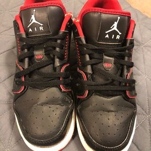 Black and red Michael Jordan size 4 youth sneakers